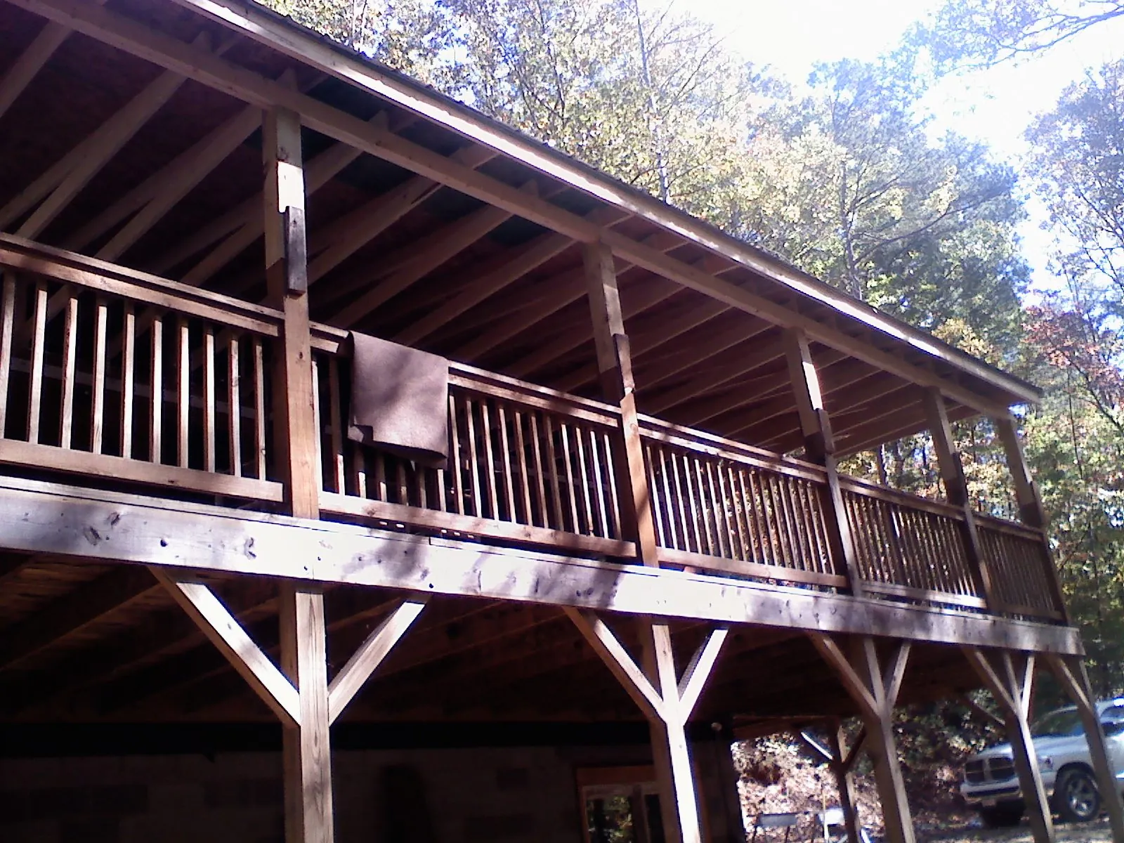 Timber framing under a new elevated porch and deck — Roof Leak Repair in Warfield by Roofing Brothers
